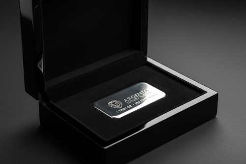 Gloss black lacquered box with velvet interior holding a silver bar